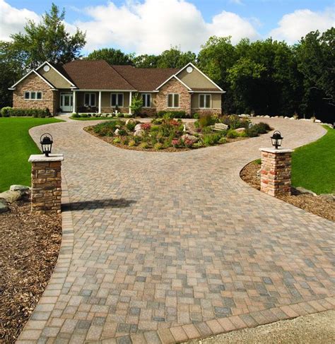 A circular Cobblestone driveway adds a degree of elegance to this home. | Driveway design ...