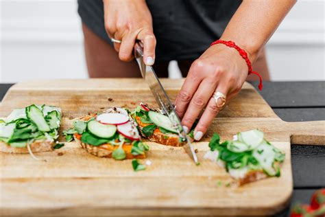 Photo Of Sliced Vegetables On Wooden Chopping Board · Free Stock Photo