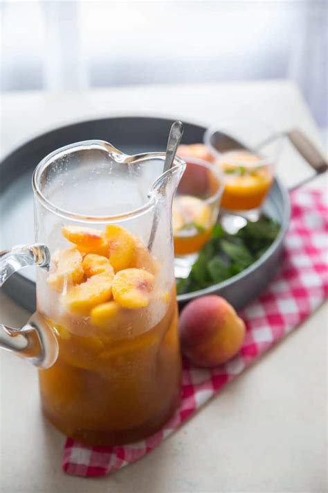 Peachy Bourbon Slush Punch - LemonsforLulu.com