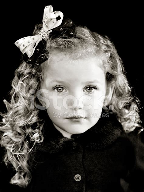 Little Girl With Curls And A Bow Stock Photo | Royalty-Free | FreeImages