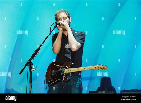 Jonny Buckland lead guitarist in Coldplay performing at the Hollywood ...