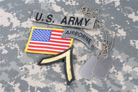 US ARMY Private Rank Patch, Airborne Tab, Flag Patch, With Dog Tag On Camouflage Uniform Stock ...