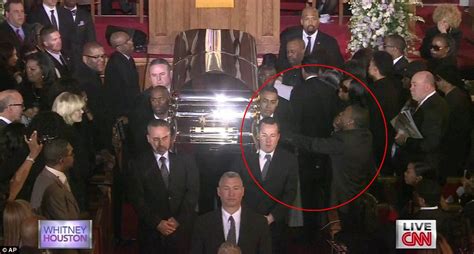 Whitney Houston's boyfriend: Ray J emotionally reaches out to her coffin at the end of her ...