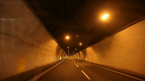 HD timelapse of car driving on highway at night through tunnels. Stock Video Footage - Storyblocks