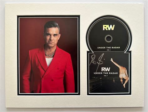 Robbie Williams Signed and Mounted CD - CharityStars