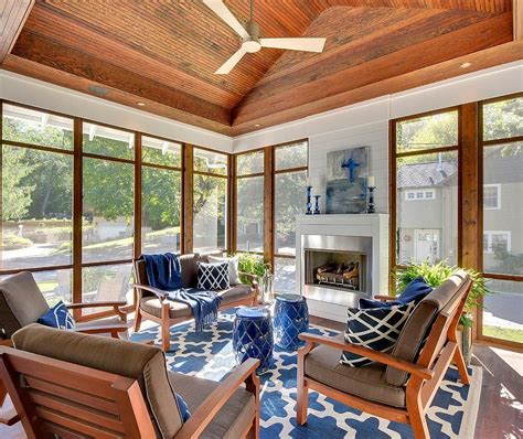 Love the balance in this room. Consider carrying the blue & white into the three-season room ...