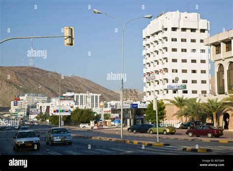 Oman, Muscat, Ruwi. Ruwi Commercial District, Morning Traffic on Al ...