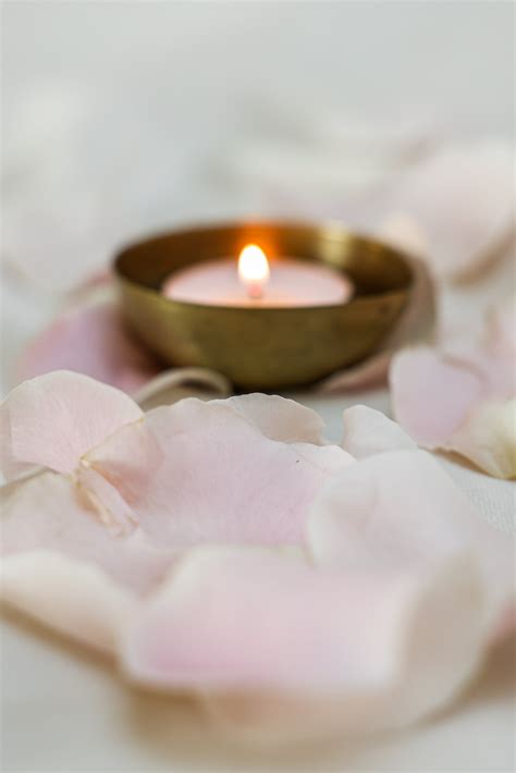 Open Book Near Tealight Candles · Free Stock Photo