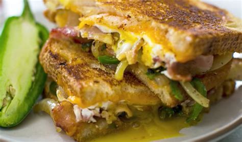 Fried Egg Sandwich Is Loaded With Cheese, Bacon, Onion And Jalapenos