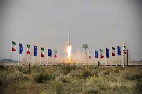 Iran Guards reveal secret space program in satellite launch | The Times ...