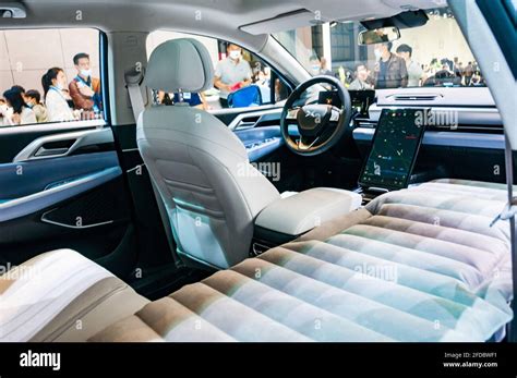 Interior of the Xpeng P5 showing sleep mode on display at the 2021 Shanghai Auto Show, China ...