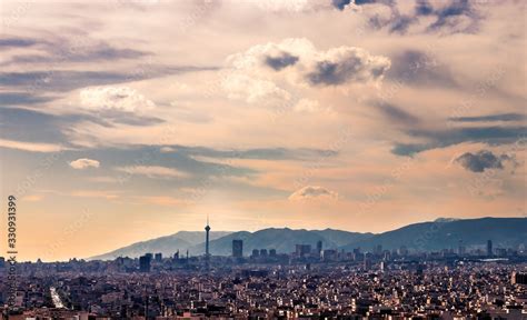 Tehran skyline in a beautiful cloudy day with golden hour light Tehran ...