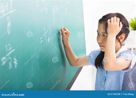 Girl Doing Math Problems on the Chalkboard Stock Photo - Image of ...