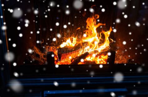 Close Up of Firewood Burning in Fireplace and Snow Stock Image - Image of burn, mantelpiece ...