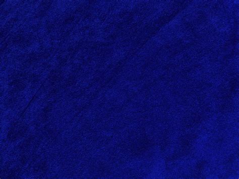 Blue velvet fabric texture used as background. Empty blue fabric ...