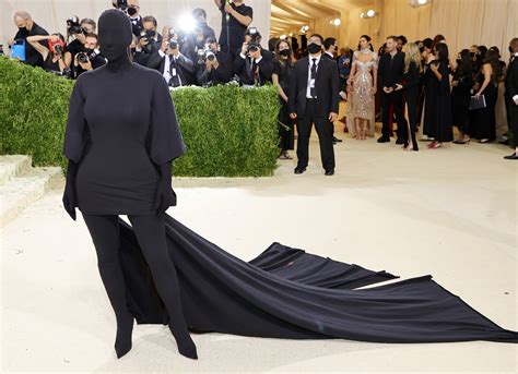 Here's Reportedly Why Kim Kardashian Covered Her Face at the Met Gala 2021 | Glamour