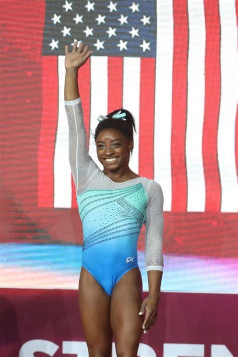 Simone Biles makes history as first woman to win four all-around world ...