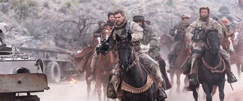 12 Strong movie review & film summary (2018) | Roger Ebert