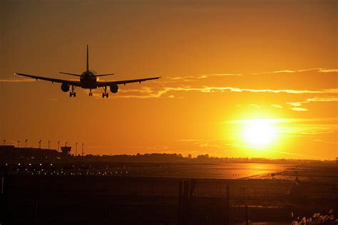 Airport In Sunset Photograph by Torsten Funke