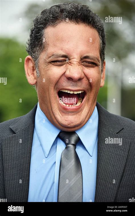 Business Man Laughing Wearing Business Suit Stock Photo - Alamy