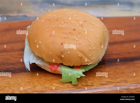 Cheese veggie burger Stock Photo - Alamy