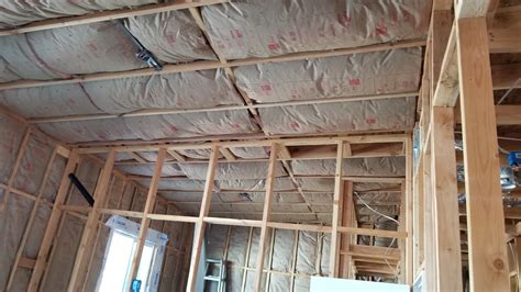 Insulation Installation – JAM Construction