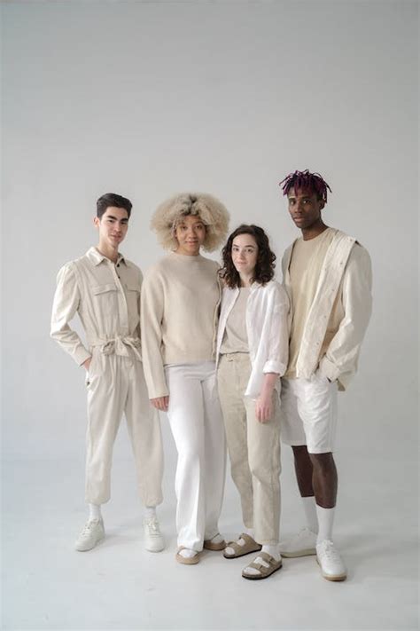 Group of People in Beige and White Outfits · Free Stock Photo