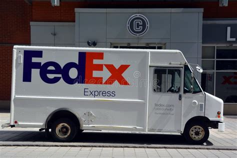 Fedex Logo on One of Their Delivery Trucks in a Street Editorial Image - Image of branding, logo ...