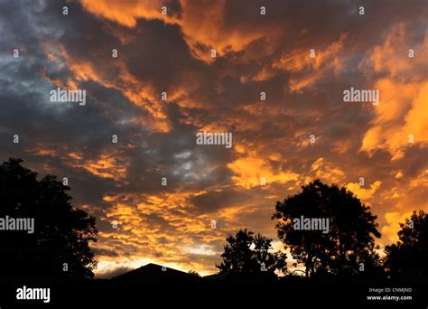 Red sunset and silhouette of a landscape Stock Photo - Alamy