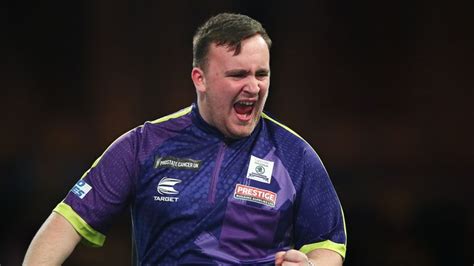 World Darts Championship: Teenager Luke Littler defeats Andrew Gilding ...