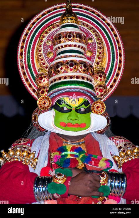 Traditional Kathakali performer with green make-up known as a pacha character in Cochin (Kochi ...