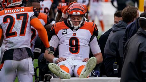 Bengals QB Joe Burrow carted off with knee injury, has initial ...