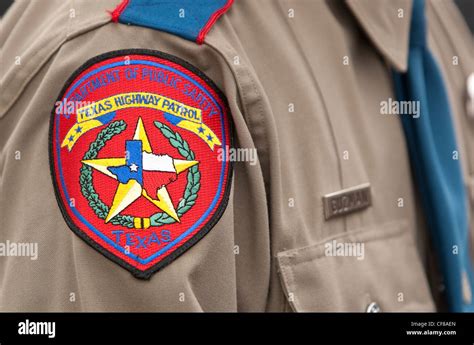 Close-up of badge for the Texas Department of Public Safety Texas highway Patrol on agent ...