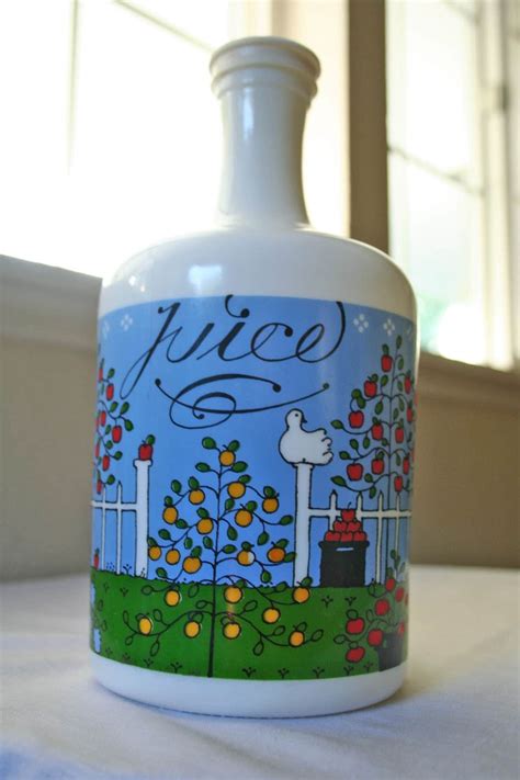 cute glass juice container with lid by ModishVintage on Etsy