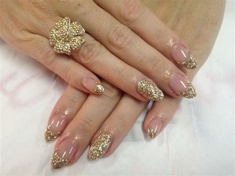 Gold glitter gels with full glitter feature nail | Nail designs, Nails, Glitter gel