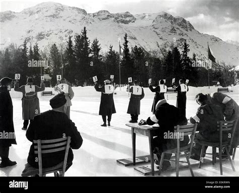 Judges holding score cards at St. Moritz Winter Olympics Stock Photo - Alamy