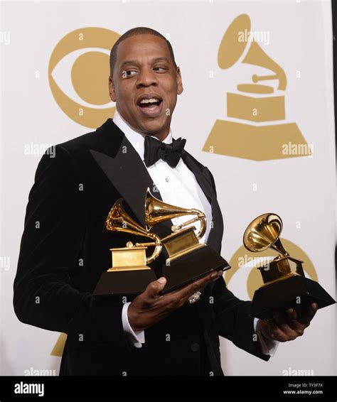 Jay-Z appears backstage with the Grammys he won at the 55th Grammy ...