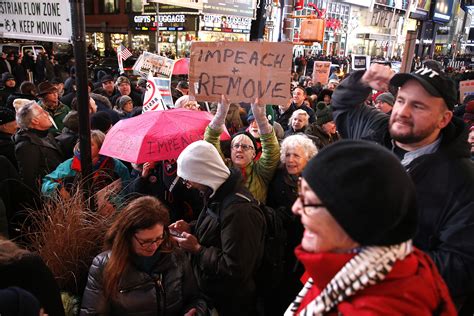 "Impeach Trump" protesters rally across U.S. — photos