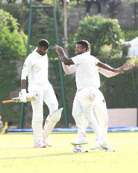 :Bengaluru:Saurabh Kumar of Uttar Pradesh celebrates with the teammates.