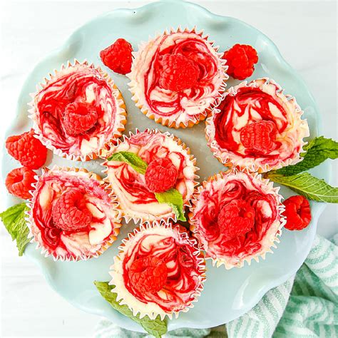 Raspberry Swirl Cheesecake Cupcakes • Food Folks and Fun