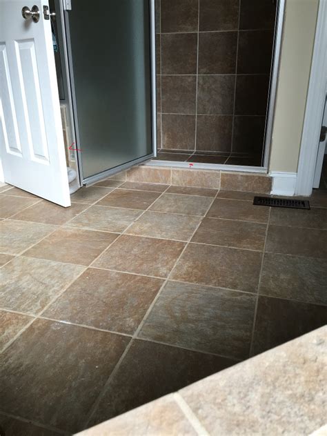 water - How do I fix squishy tiles in shower floor? - Home Improvement Stack Exchange