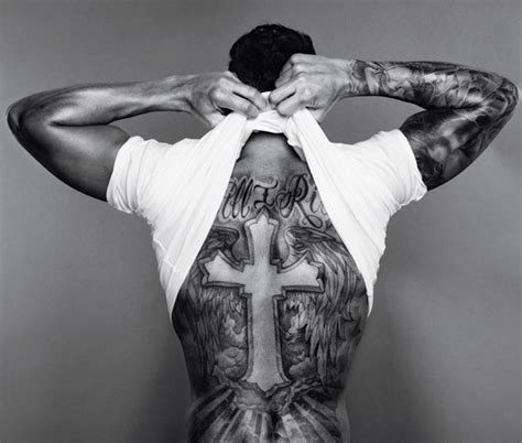 Decoding F1 star Lewis Hamilton's tattoos - Rediff Sports