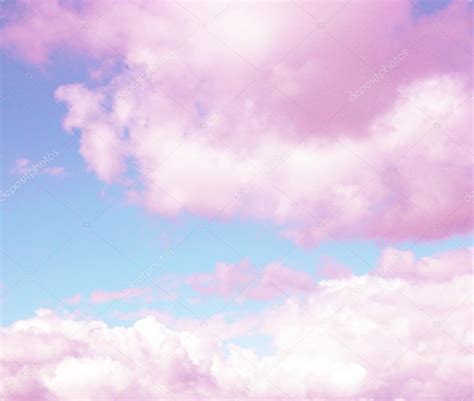 Blue sky background with pink clouds — Stock Photo © belchonock #63365229