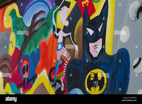 Berlin Wall Cartoon Graffiti street art Batman Stock Photo - Alamy