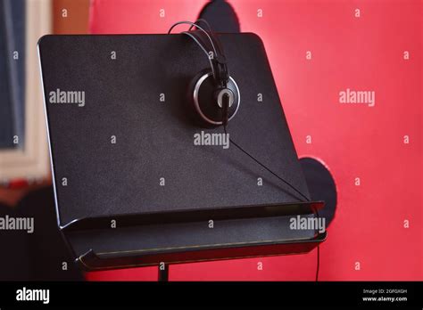 Headphones in recording studio Stock Photo - Alamy