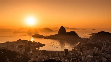 Download wallpaper 1920x1080 sun, sunset, city, shore full hd, hdtv ...