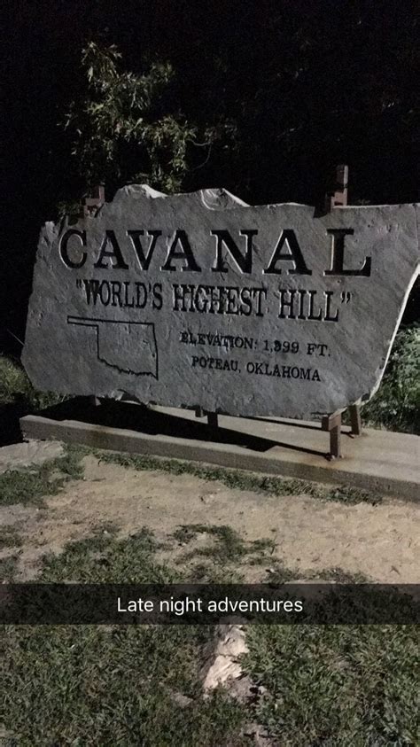 the sign for cavanal world's highest hill at night