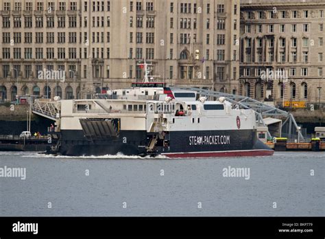 Isle of Man ferry Manannan departing from Liverpool landing stage with Royal Liver Building in ...