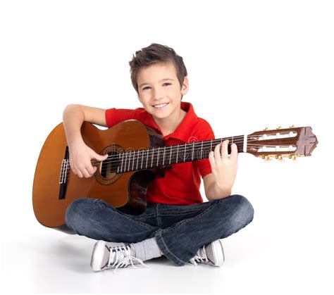 Happy Boy Playing On Acoustic Guitar Stock Image - Image of children, classical: 28485351