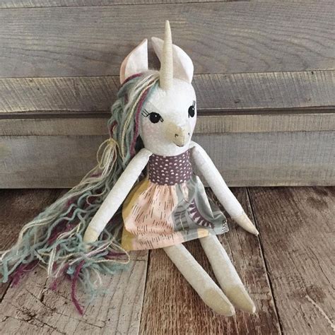 Handmade unicorn doll with dress by @ahappycarrot featuring Roam fabric ...